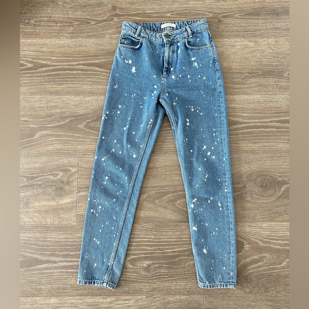 Straight-leg faded denim jeans decorated with prints